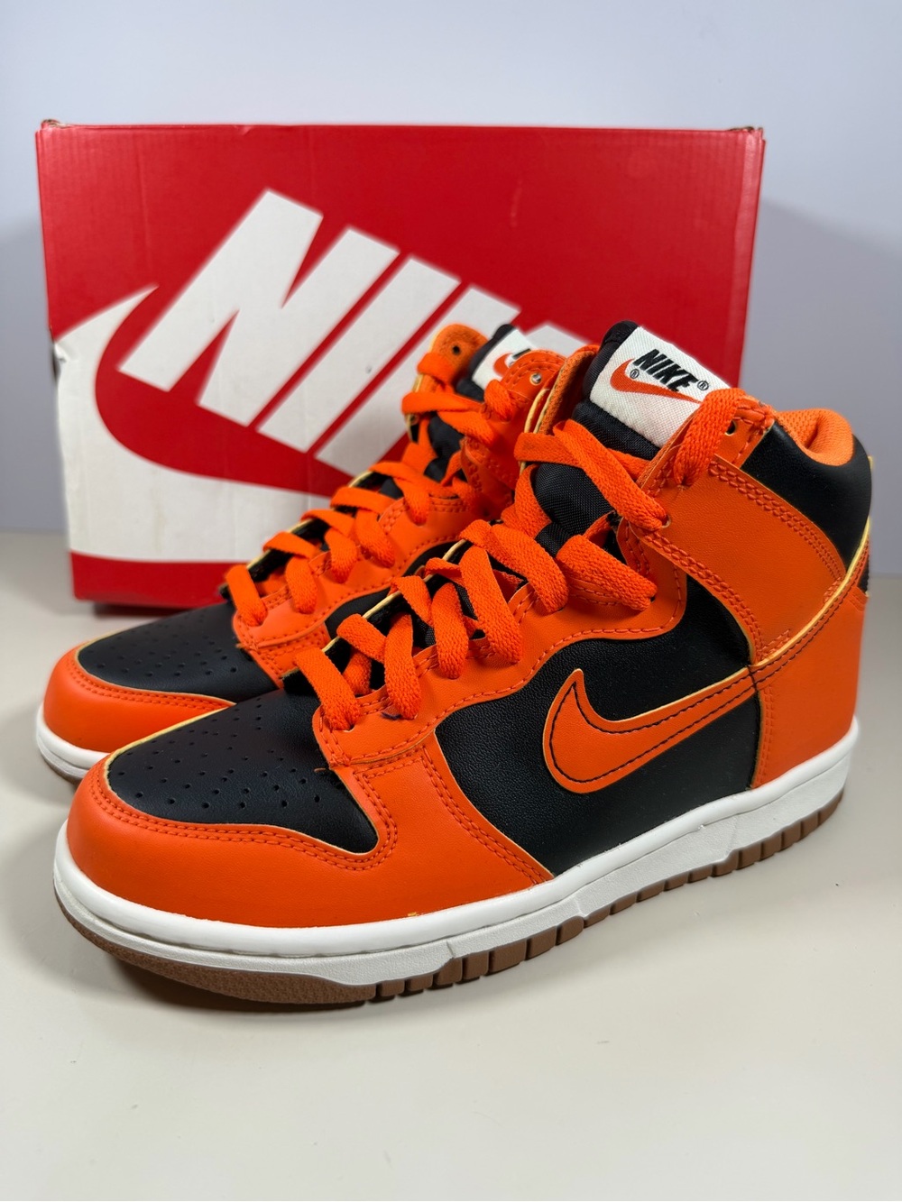 Nike Kids High-Top Sneakers in Orange and Black